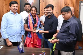 Gongadi Trisha and Revanth Reddy