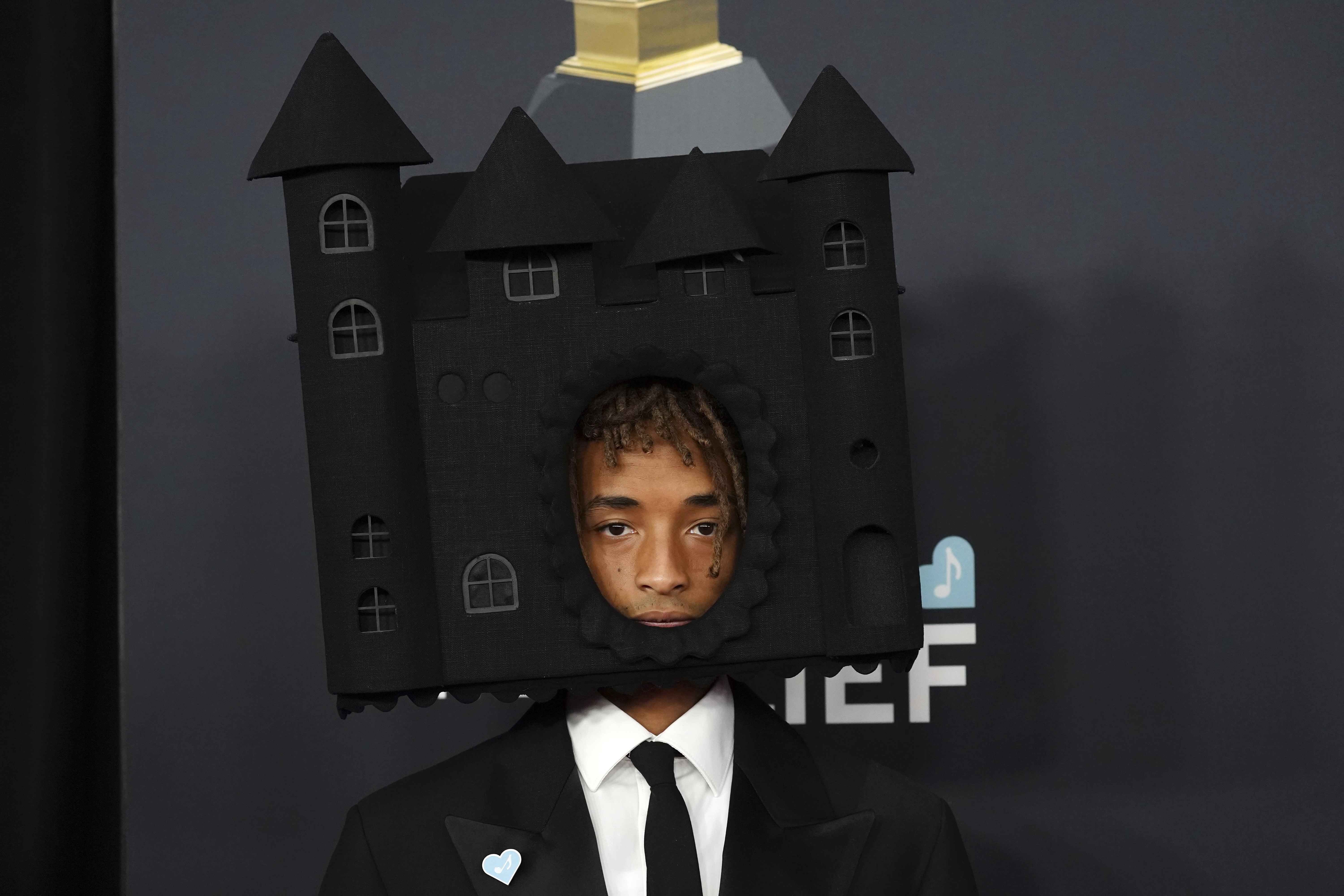 Jaden Smith arrives at the 67th annual Grammy Awards Addams spooky dollhouse on his head