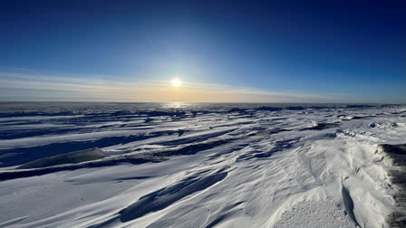 The sun sets outside of the northwest Alaska village of Point Hope on the Chukchi Sea, Feb. 21, 2024. A fatal shooting at a home in a remote Inupiat whaling village on Alaska's northwest coast on Sunday, Feb. 25, 2024, shook the small community in Point Hope. (Ka'ainoa Ravey via AP)