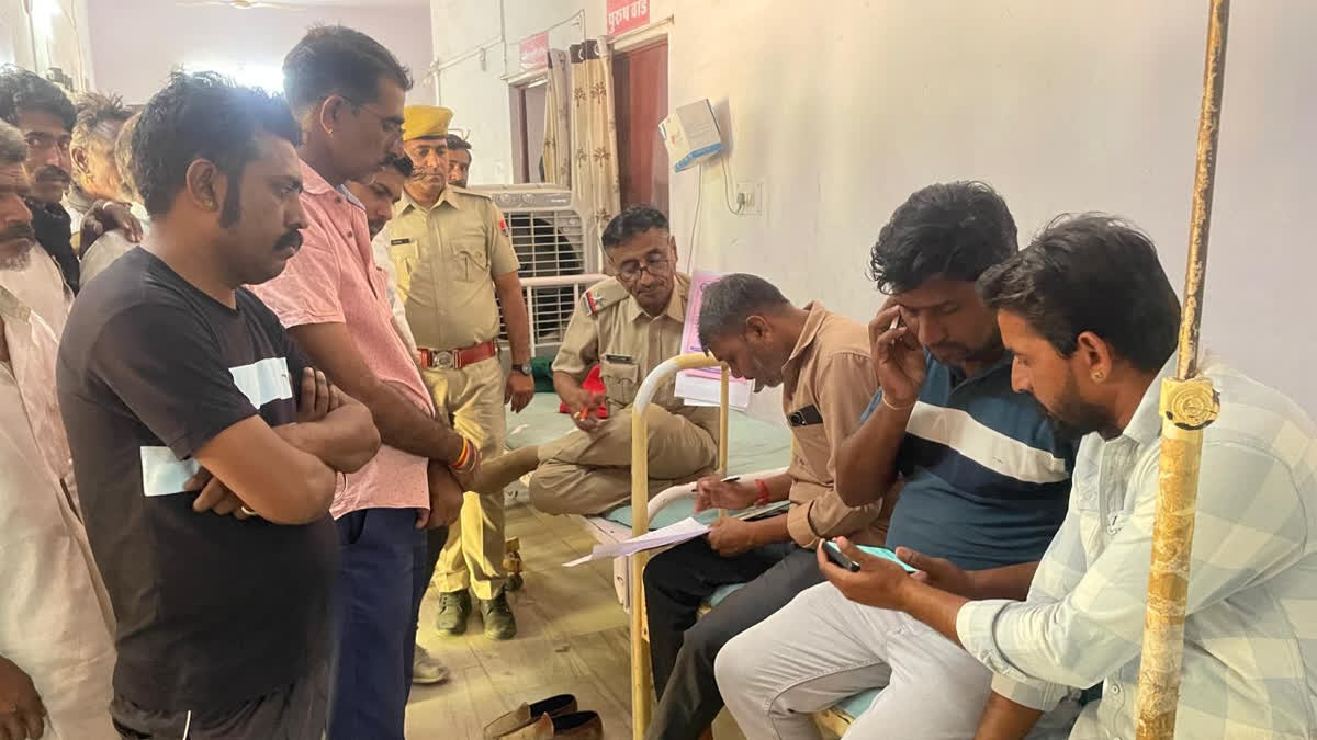 Policemen taking accident report
