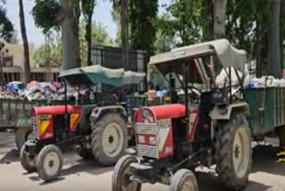 Garbage trolleys are standing in the Municipal Council of shriganganagar