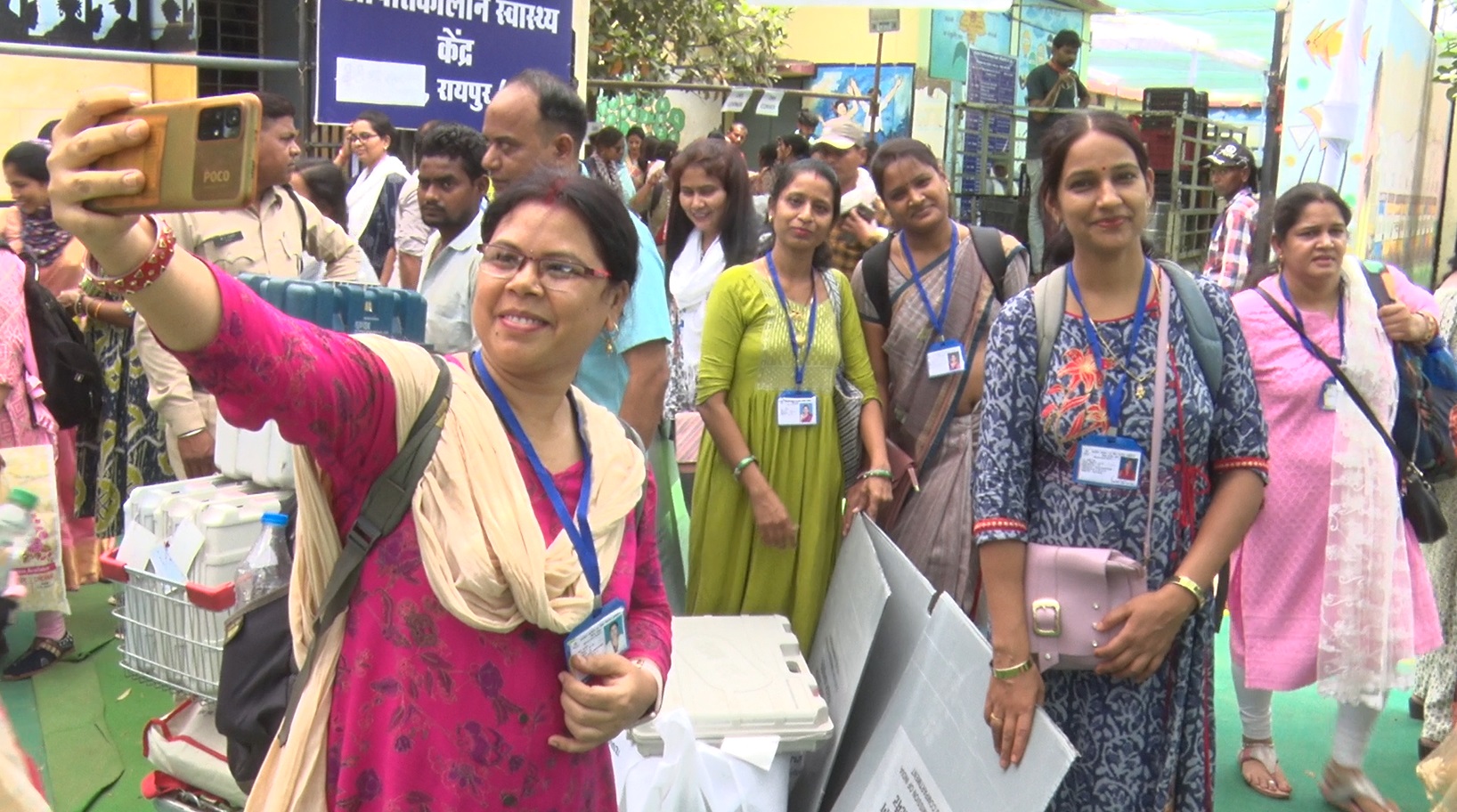 Female polling officer taking selfie