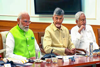 Prime Minister Narendra Modi with key allies TDP chief N Chandrababu Naidu and JD(U) chief Nitish Kumar during NDA meeting in New Delhi on June 5, 2024.