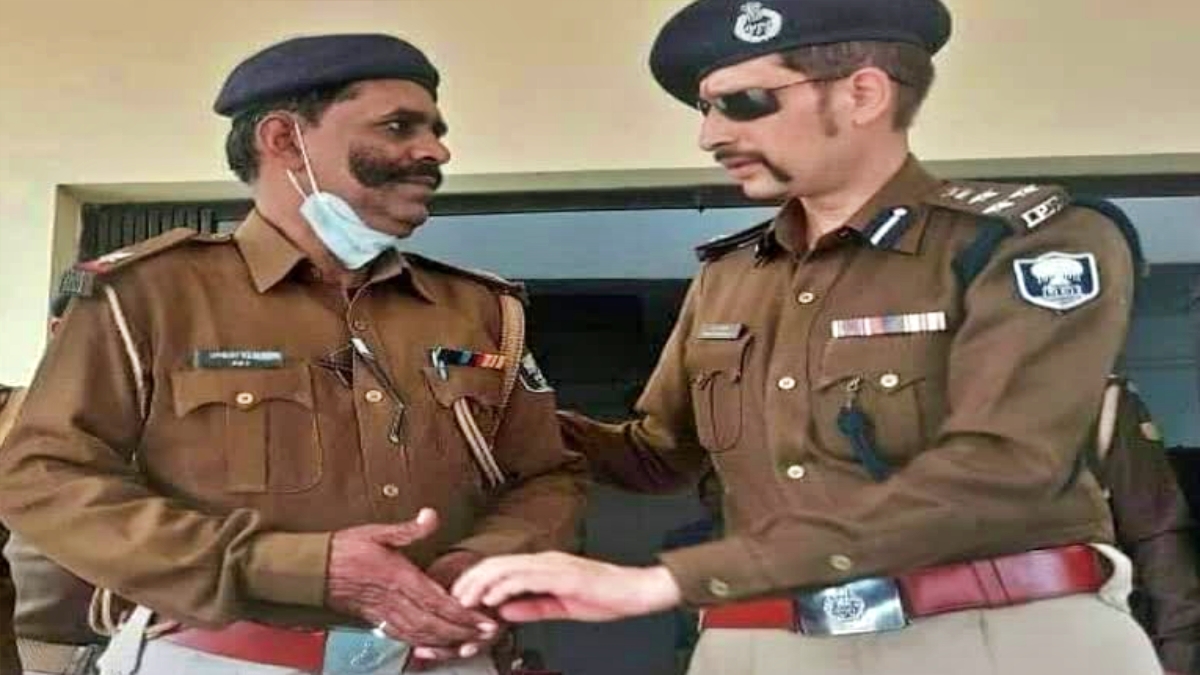 Naresh Hazari with a senior official.