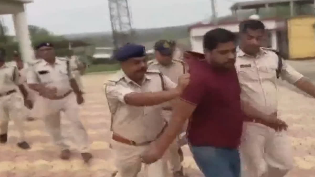 Sidhi urination case: Video shows cops dragging Pravesh Shukla for ...