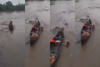 man-jumps-river-from-bridge-rescue-canoe-boat