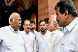 Congress chief and RS LoP Mallikarjun Kharge, extreme left, in conversation with Congress MP Jairam Ramesh and K Suresh as they walk out from Rajya Sabha on July 3