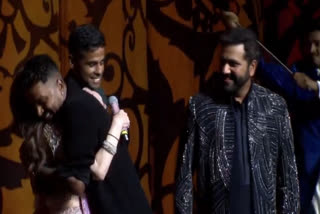 Owner of the Mumbai Indians franchise in Indian Premier League Nita Ambani and Mukesh Ambani called the T20 World Cup winning squad members including the skipper Rohit Sharma, Suryakumar Yadav, and Hardik Pandya on the stage during the celebrations of Anant and Radhika Sangeet ceremony.