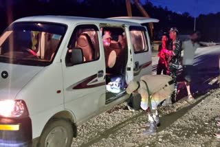 Police and army personnel checking at a checkpoint in Manipur