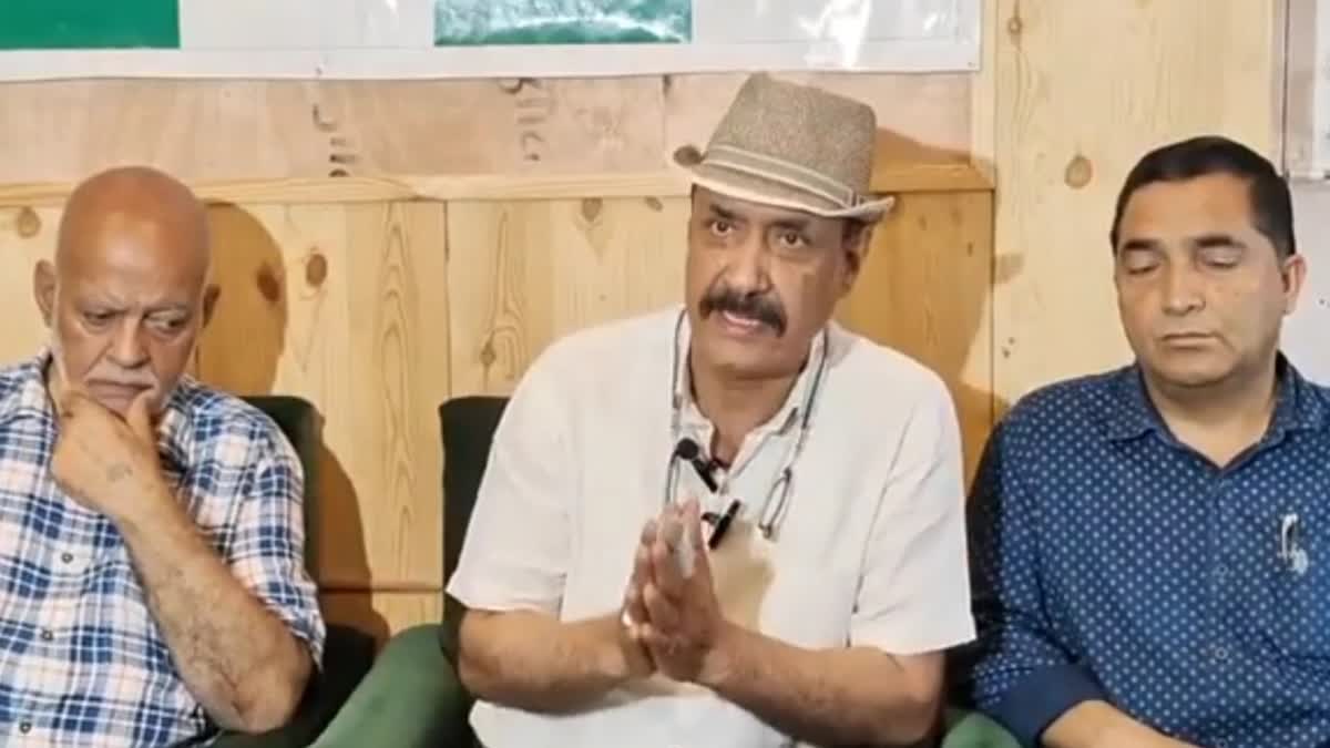 PDP Leader Basharat Bukhari (C) addressing a presser at PDP office in Srinagar on Tuesday, Aug 6, 2024