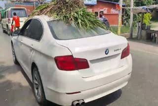 bihar farmer carries fodder on BMW