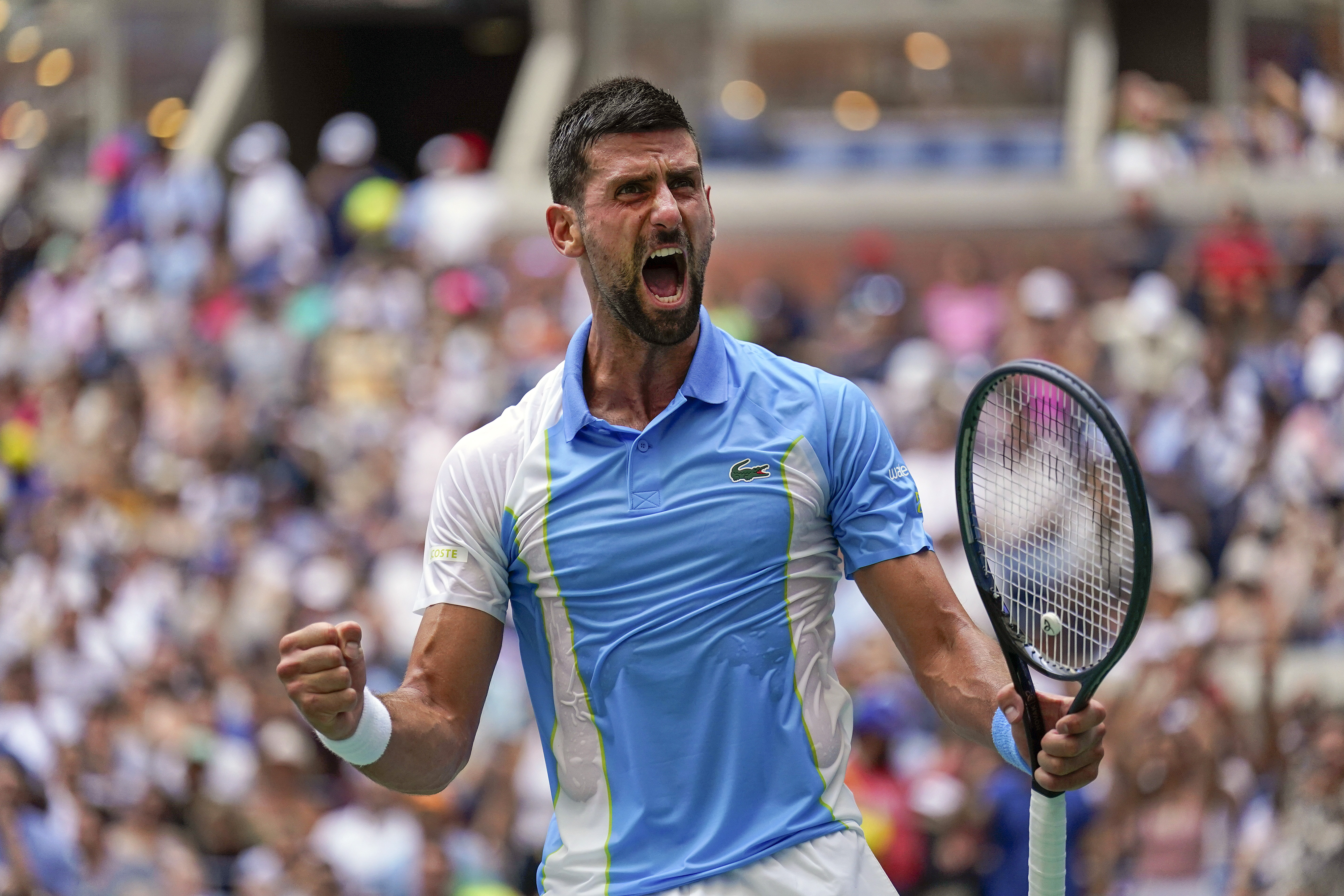 Novak Djokovic, of Serbia, reacts after defeating Taylor Fritz, of the United States, during the quarterfinals of the U.S. Open tennis championships, Tuesday, Sept. 5, 2023, in New York.