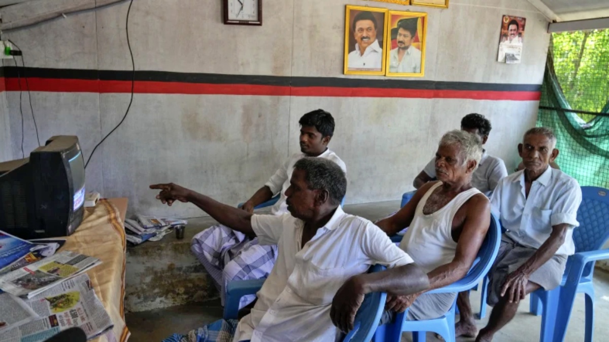 Villagers watch results of U.S. elections on a television in Thulasendrapuram, on Wednesday.