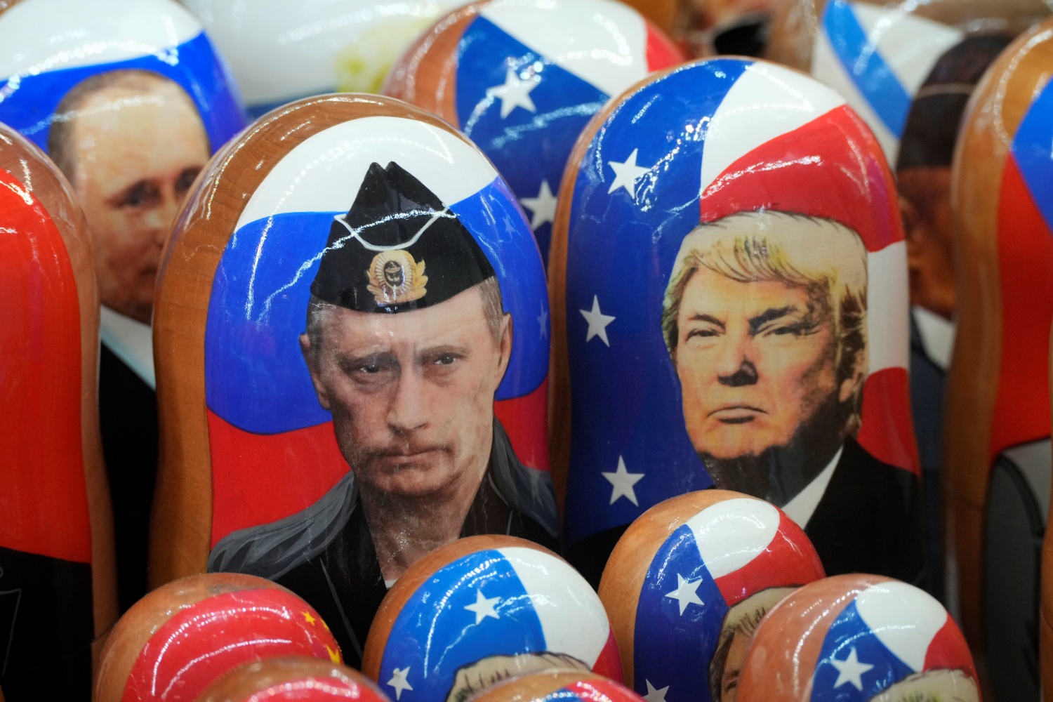 Traditional Russian wooden dolls, called Matryoshka, depicting Donald Trump, right, and Vladimir Putin.