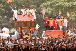 BJP supporters arrives at a rally in Jamshedpur