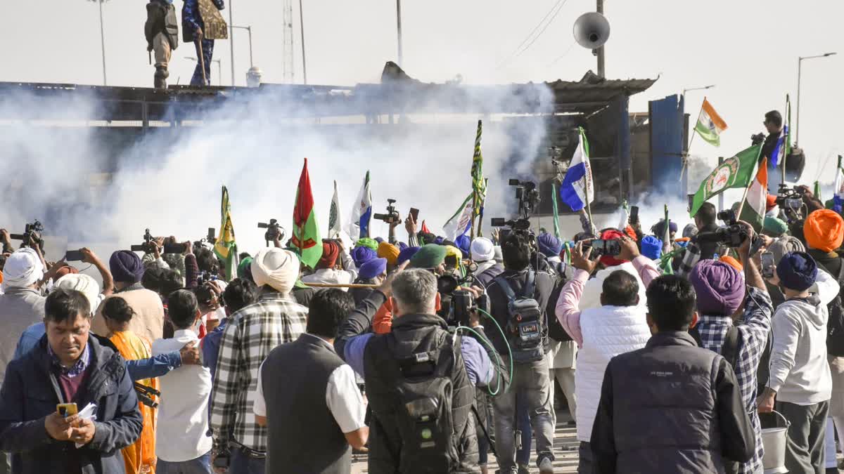 Patiala: Tear gas being used by security personnel to disperse the farmers moving towards barricades during their foot march to Delhi, at Shambhu border in Patiala district, Punjab, Friday, Dec. 6, 2024. A 'jatha' of 101 farmers on Friday began its foot march to Delhi from their protest site at Shambhu border, but was stopped a few metres away by a multilayered barricading.