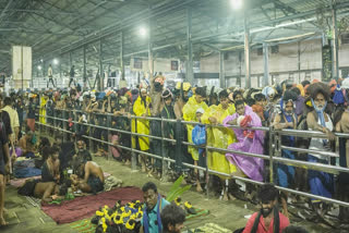 Devotees wait to offer prayers at the Sabarimala temple, in Pathanamthitta district, Kerala, Monday, Dec. 2, 2024.