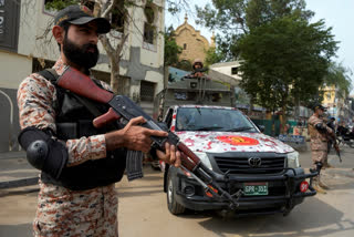 At least 29 people were killed in two blasts in southwestern Pakistan near the offices of two election candidates, a day before parliamentary elections.