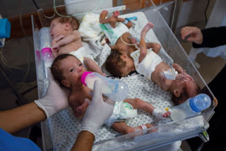 Medics prepare premature babies for transport to Egypt after they were evacuated from Shifa Hospital in Gaza City to a hospital in Rafah, Gaza Strip on Nov. 20, 2023. The war in Gaza has sparked a humanitarian catastrophe that has prompted shortages of the most basic necessities. Among those hardest hit are babies, young children and their parents. That's because diapers and formula are hard to find or have prices that are increased to unaffordable prices. Parents are looking to inadequate or even unsafe alternatives. (AP Photo/Fatima Shbair, File)