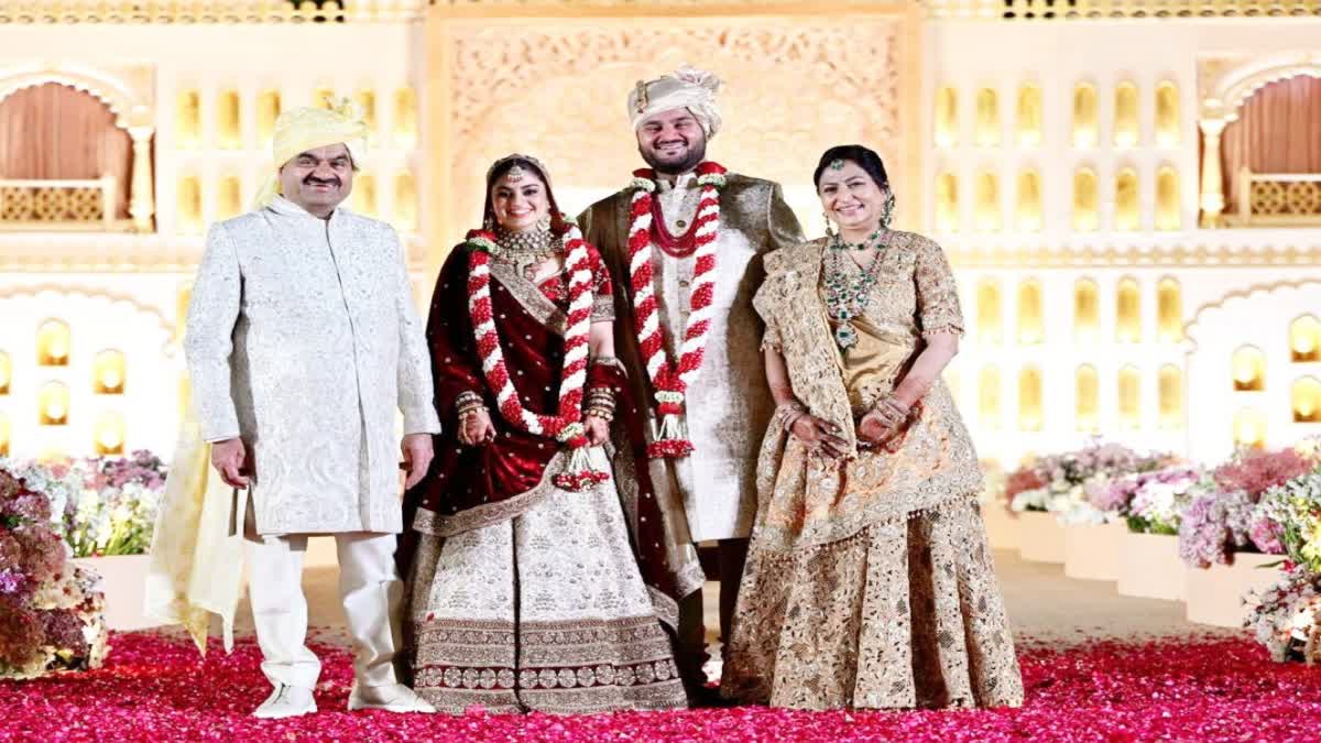 Gautam Adani and his wife with Jeet Adani and Diva