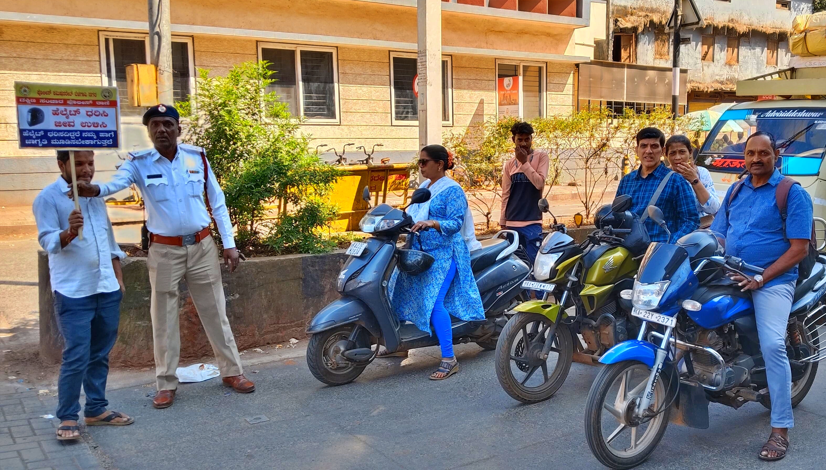 AWARENESS CAMPAIGN BY THOSE WHO DON'T WEAR HELMETS IN BELAGAVI