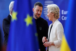 European Commission President Ursula von der Leyen, right, speaks with Ukraine's President Volodymyr Zelenskyy, center, as they arrive for an EU Summit at the European Council building in Brussels, Thursday, March 6, 2025.