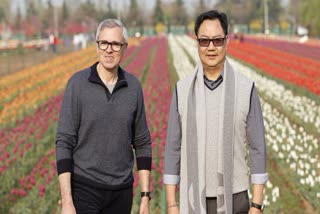 kiren rijiji at tulip garden