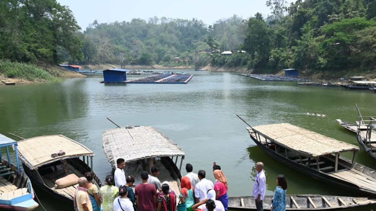 Assam's Dhubri Ghat voters used boats to arrive at a polling booth to cast their votes during the third phase of the elections.