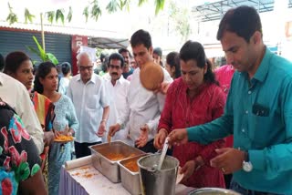 Voters enjoy free dosa and tea by showing ink mark