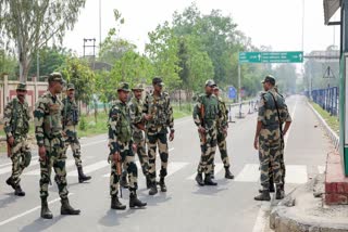 BSF personnel stand guard near Attari-Wagah border in Amritsar on Wednesday.
