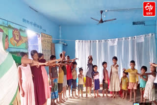 CHILDREN PLAYING IN FLOOD RELIEF CAMP