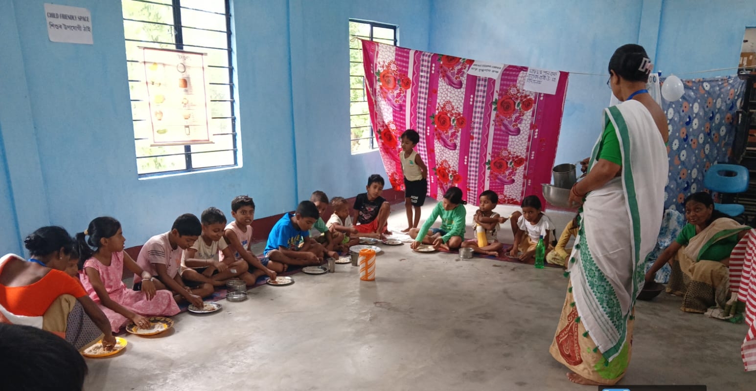 CHILDREN PLAYING IN FLOOD RELIEF CAMP