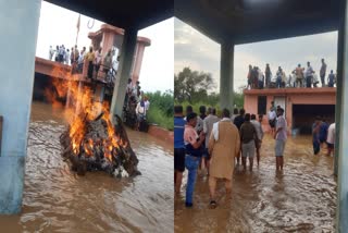 flood-came-during-funeral-in-una-villagers-trapped-in-flood-una-130-people-were-rescued