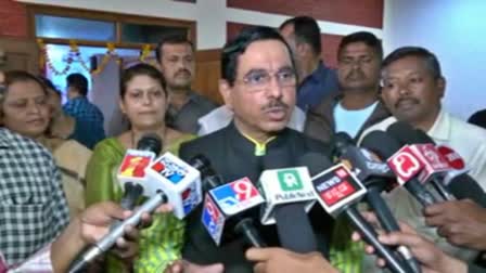 Minister Prahlad Joshi spoke to reporters.