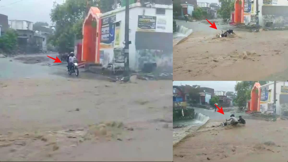 Youth riding a bike crossing a rainy drain