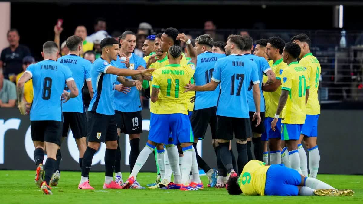 Players of Brazil and Uruguay argue during a Copa America quarterfinal