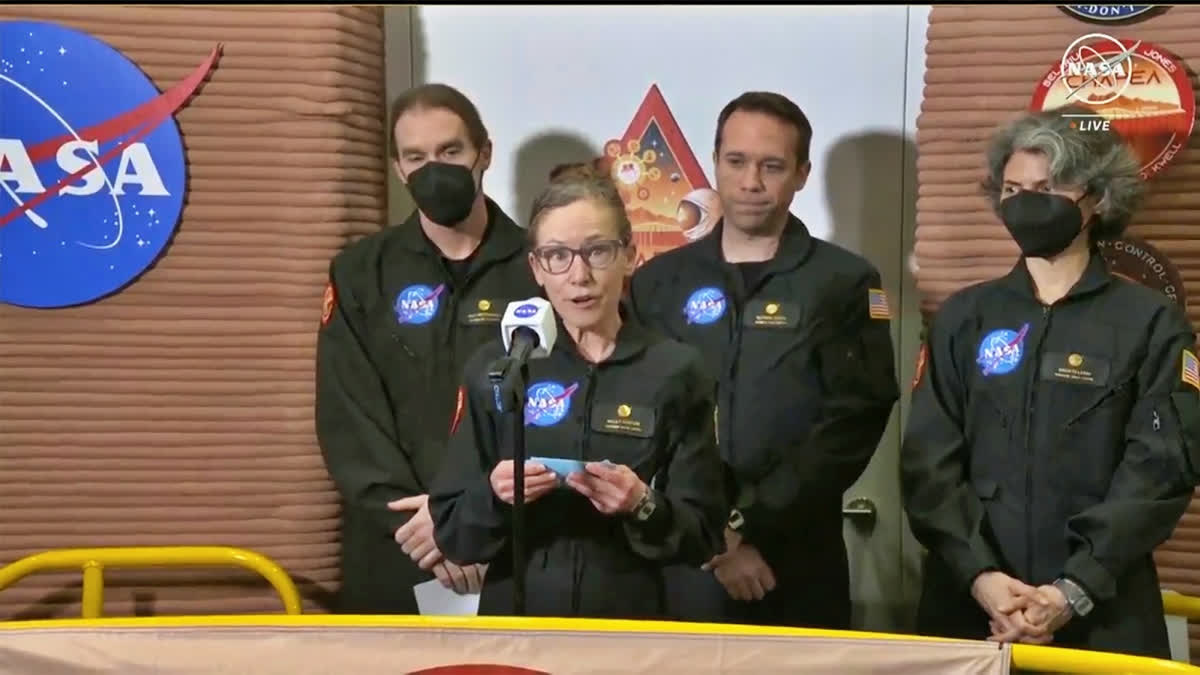 Kelly Haston, a crew member of the first CHAPEA mission, speaks in front of other members, from left to right, Ross Brockwell, Nathan Jones, and Anca Selariu, Saturday, July 6, 2024, at Johnson Space Center in Houston, Texas.