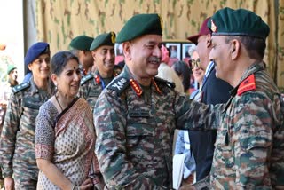 Army Chief General Upendra Dwivedi (M) along with his wife Sunita Dwivedi interact with Army officers during the Kargil Vijay Diwas in Ladakh