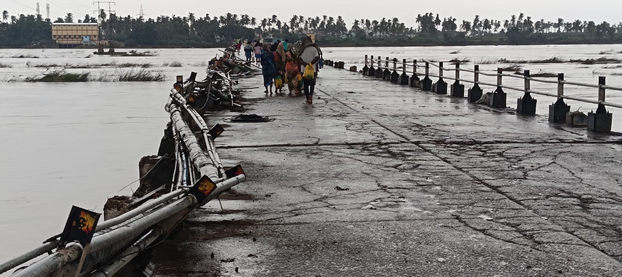 flood water  pedestrian traffic  Koppal