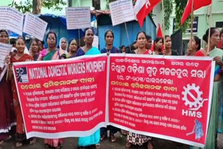 workers  stage protest in front of labour office