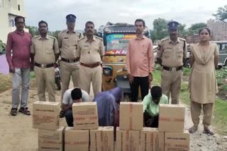 Two Volunteers Arrested in Liquor Case