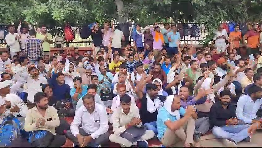 Ambulance employee sitting in strike