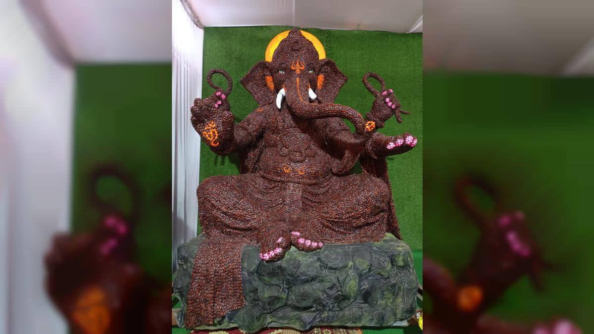 Lord Ganesh idol made using 2.21 lakh Tamarind seeds by sculptor Sunil Anandache