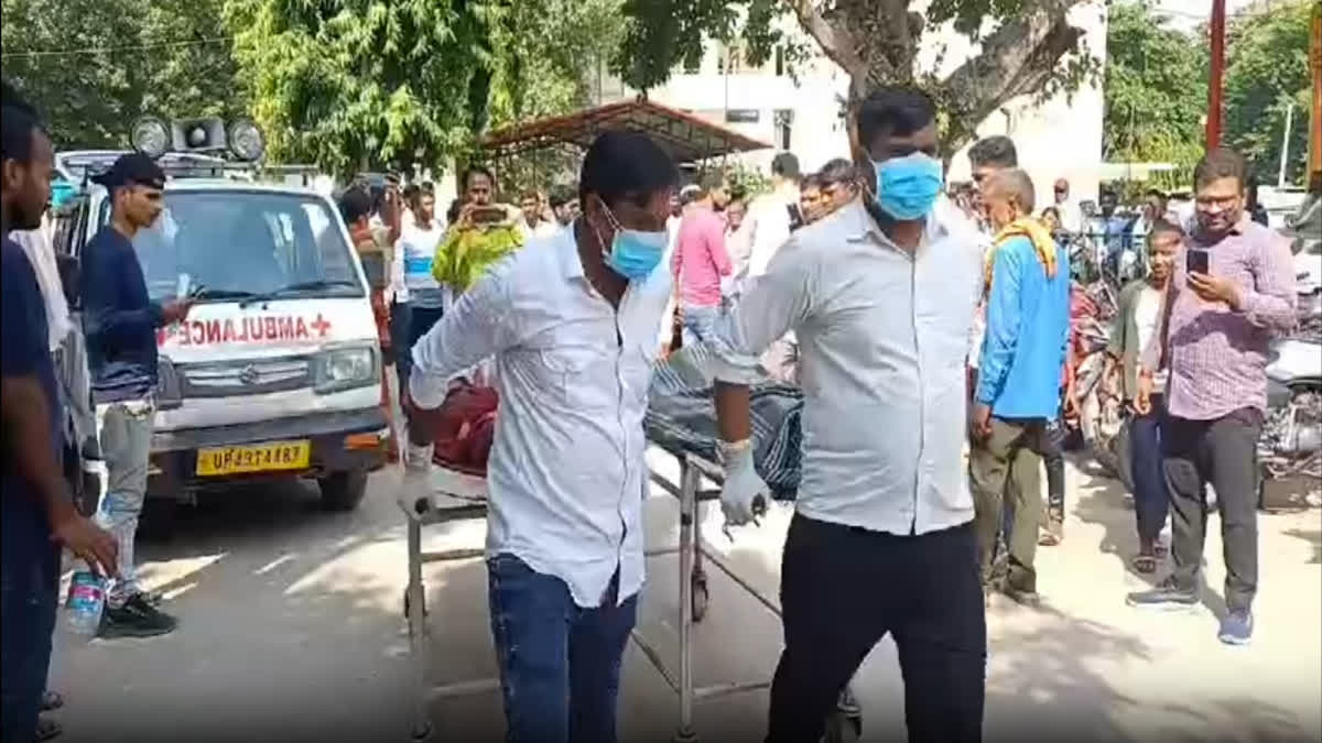 Staff carry the injured at the hospital in Gonda after an explosion in an illegal firecracker factory