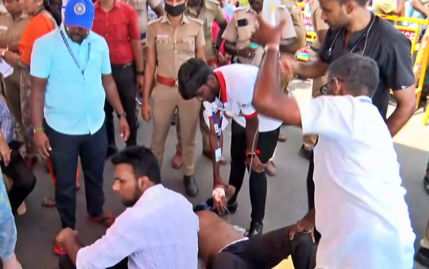 image showing health staffs taking care of chennai air show spectator who fainted due to heatwave