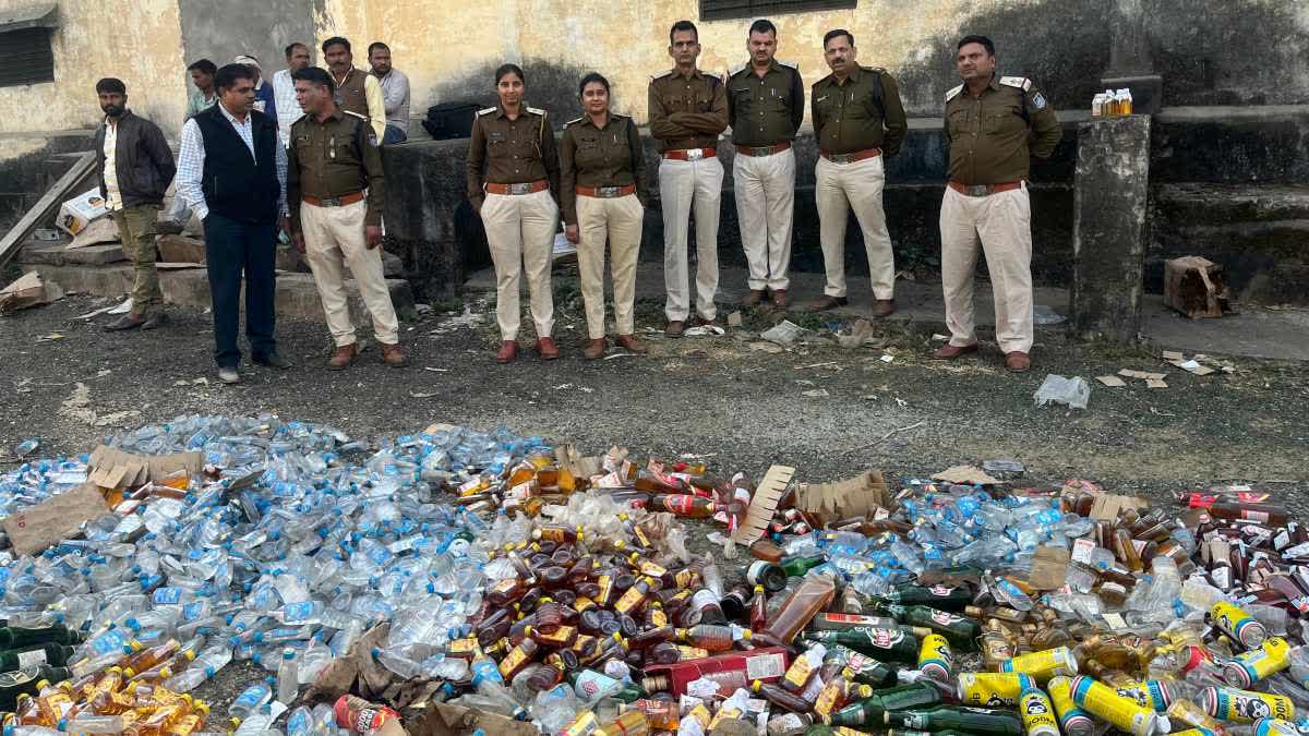 BHOPAL BULLDOZER RUNS LIQUOR BOTTLE