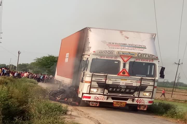 truck cought fire by high-tension wire 