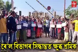 tea workers protest at mariani bhelaguri tea estate against railway department decision to close a road