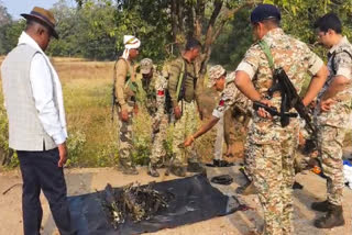 Bijapur: Security personnel near the site where Naxals blew up a District Reserve Guards (DRG) vehicle by an improvised explosive device (IED) that killed at least eight jawans and a civilian were killed, in Chhattisgarh's Bijapur district, Monday, Jan. 6, 2025.