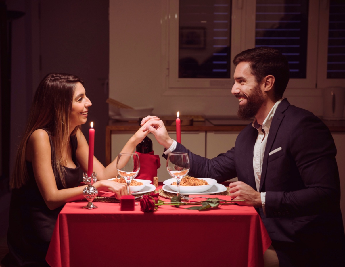 Couple having candlelight dinner